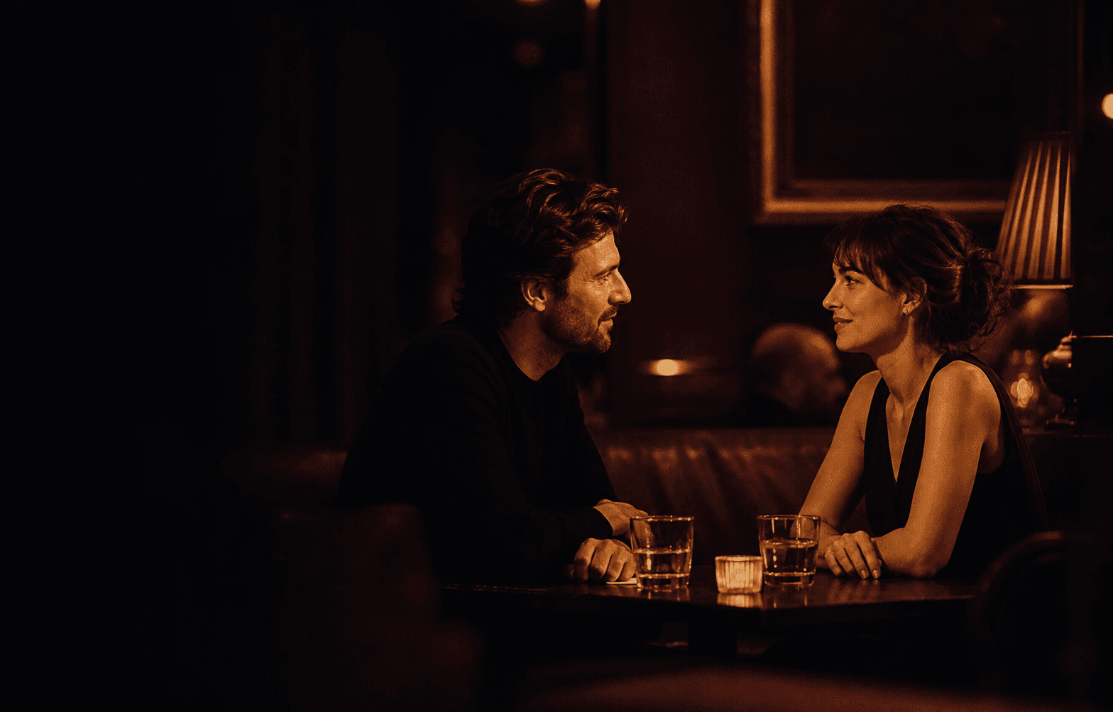 Two people sharing a quiet late-night first date
